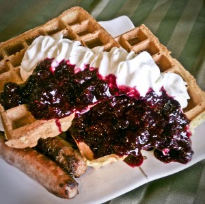waffles with mixed berries and whipped cream